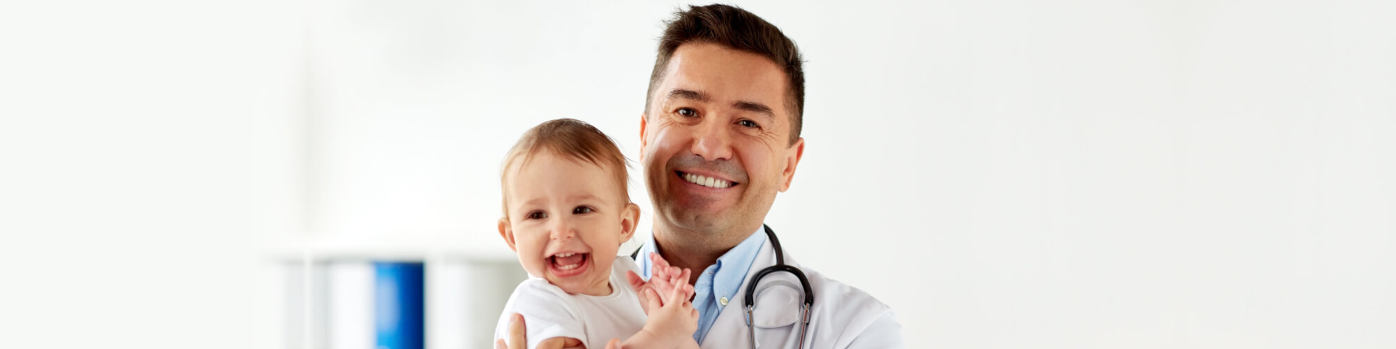 doctor holding a baby